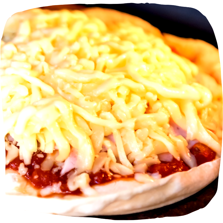Image of When it’s done get the pizza and put cheddar cheese,...